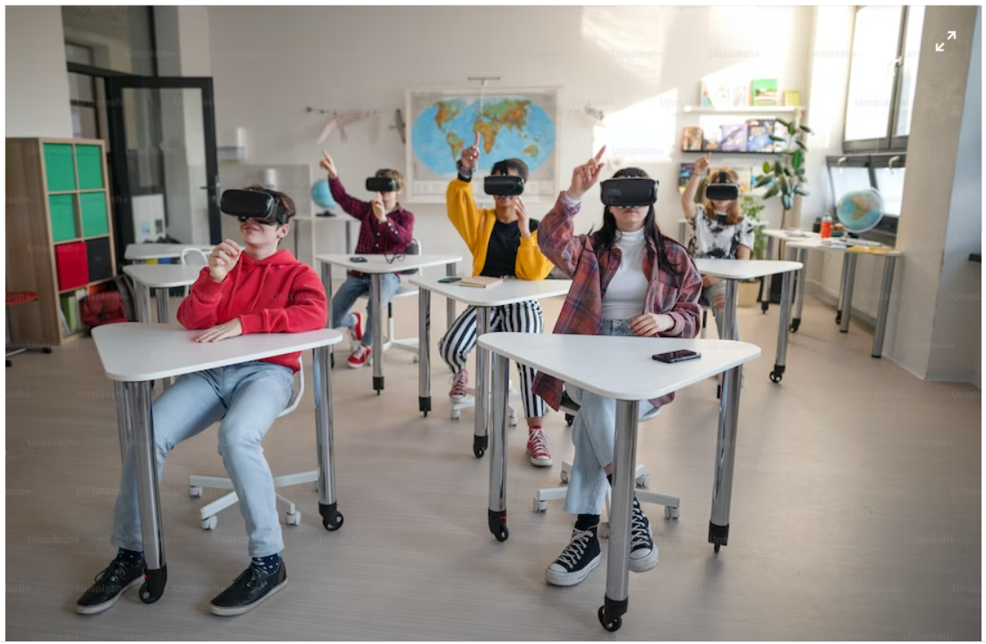 Children in a classroom utilizing VR technology