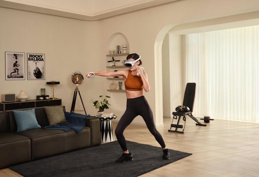 A girl doing a boxing workout with a VR headset.